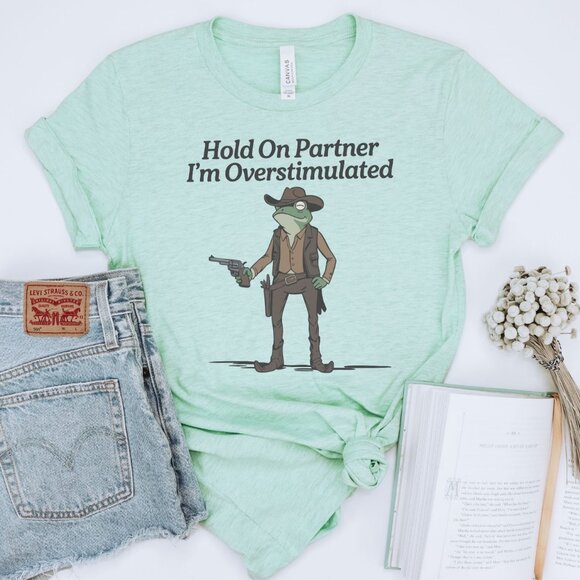 Tops - Hold On Partner I'm Overstimulated Shirt, Funny Shirt, ADHD Shirt, Autism Shirt